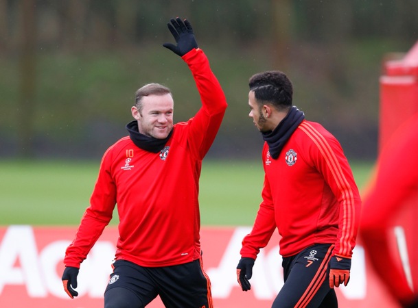 Wayne Rooney and Memphis Depay train ahead of Manchester United's match with PSV. Action Images via Reuters / Carl Recine