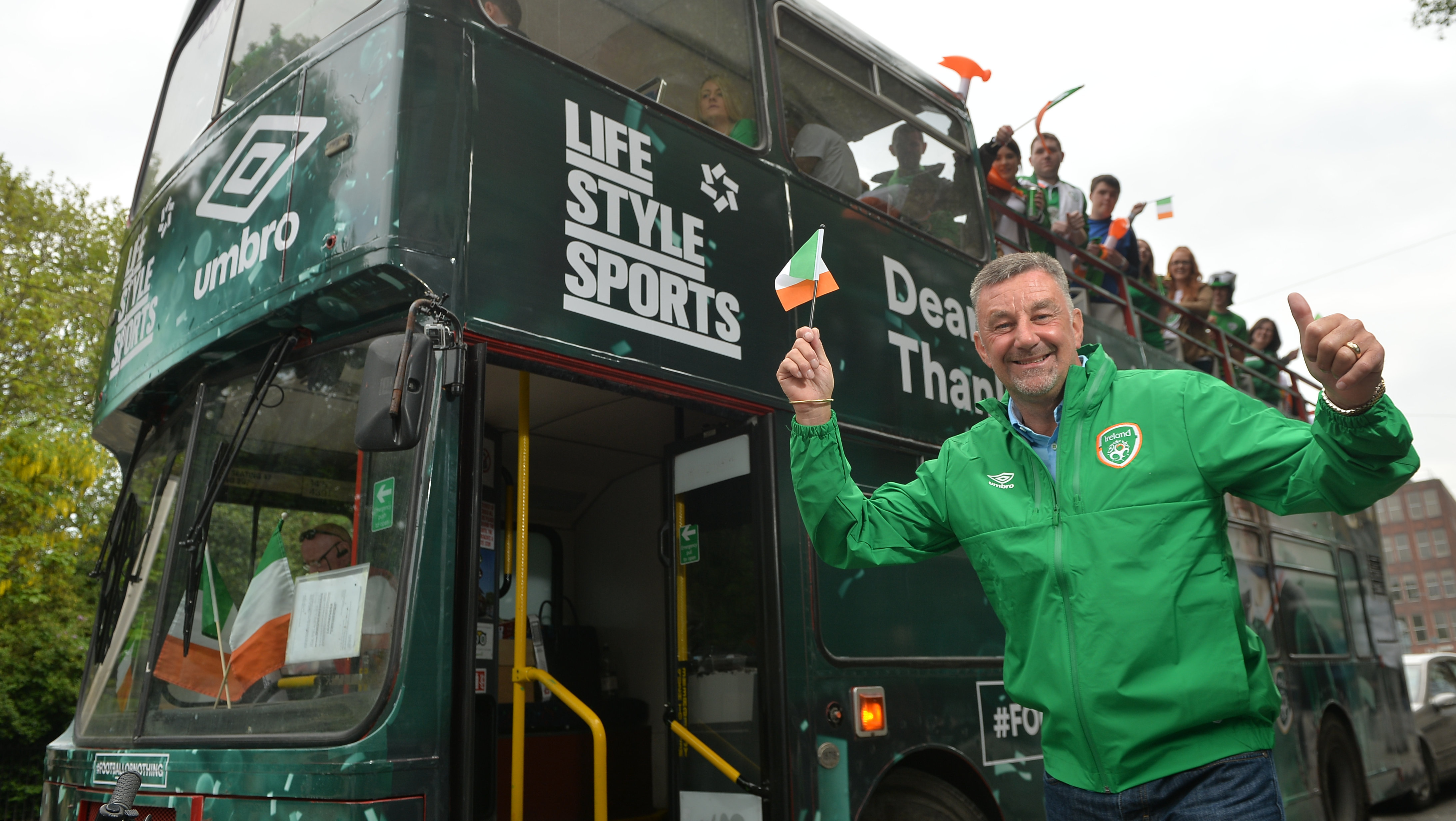 Ireland fans with Irish footballing legend John Aldridge, on our Open Top Supporters Bus arriving at Aviva Stadium.