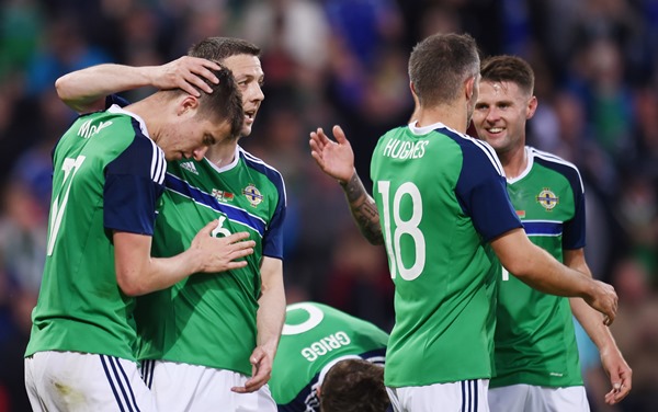 Northern Ireland players celebrate after qualifying for Euro 2016 Pictures supplied by Action Images