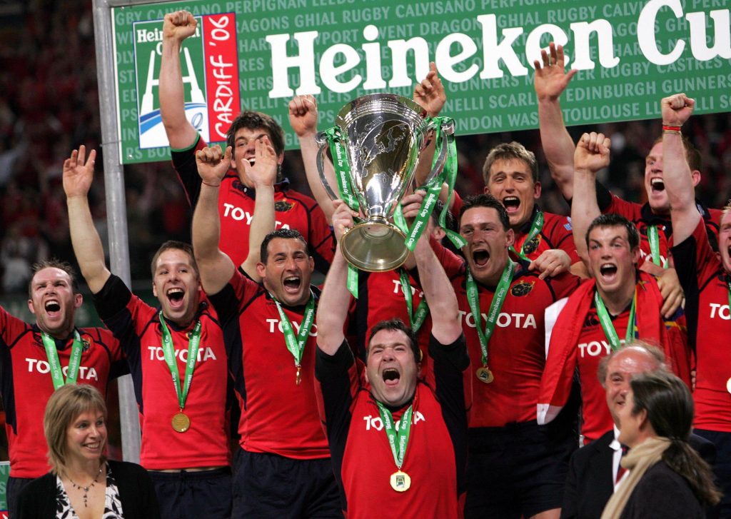 The Munster team celebrates as captain Anthony Foley (C) lifts the trophy following their Heineken Cup rugby final match against Biarritz at the Millennium Stadium in Cardiff, Wales May 20, 2006. REUTERS/David Davies/Pool Picture Supplied by Action Images *** Local Caption *** 2006-05-20T165845Z_01_CDF13D_RTRIDSP_3_SPORT-RUGBY-HEINEKEN.jpg