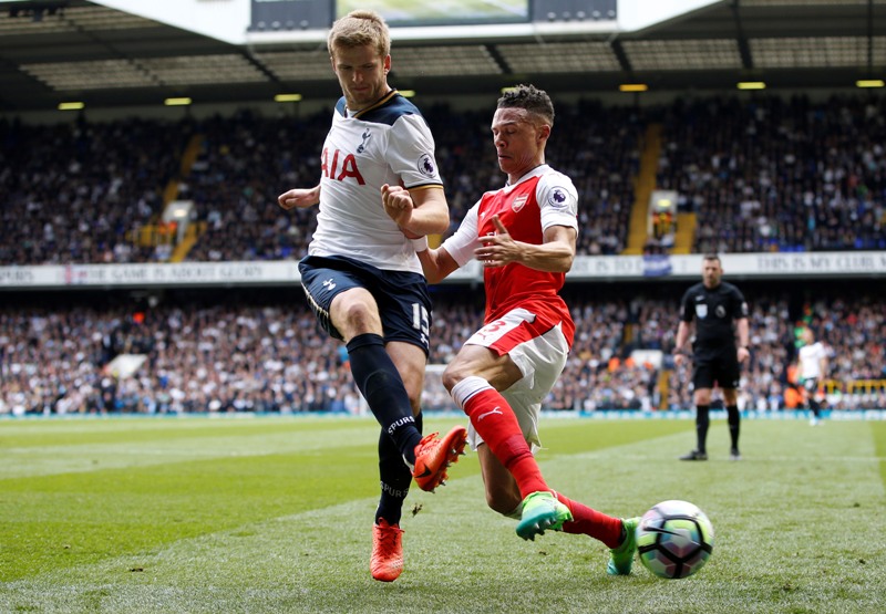 Britain Football Soccer - Tottenham Hotspur v Arsenal - Premier League - White Hart Lane - 30/4/17 Tottenham's Eric Dier in action with Arsenal's Kieran Gibbs  Action Images via Reuters / Paul Childs Livepic EDITORIAL USE ONLY. No use with unauthorized audio, video, data, fixture lists, club/league logos or "live" services. Online in-match use limited to 45 images, no video emulation. No use in betting, games or single club/league/player publications.  Please contact your account representative for further details.